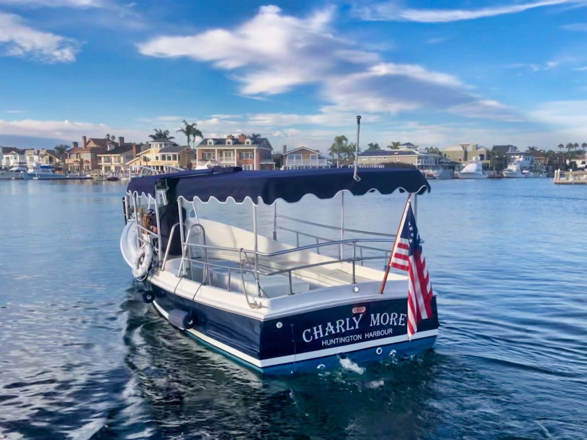 Family-friendly boat rental Charly More cruising Huntington Harbour