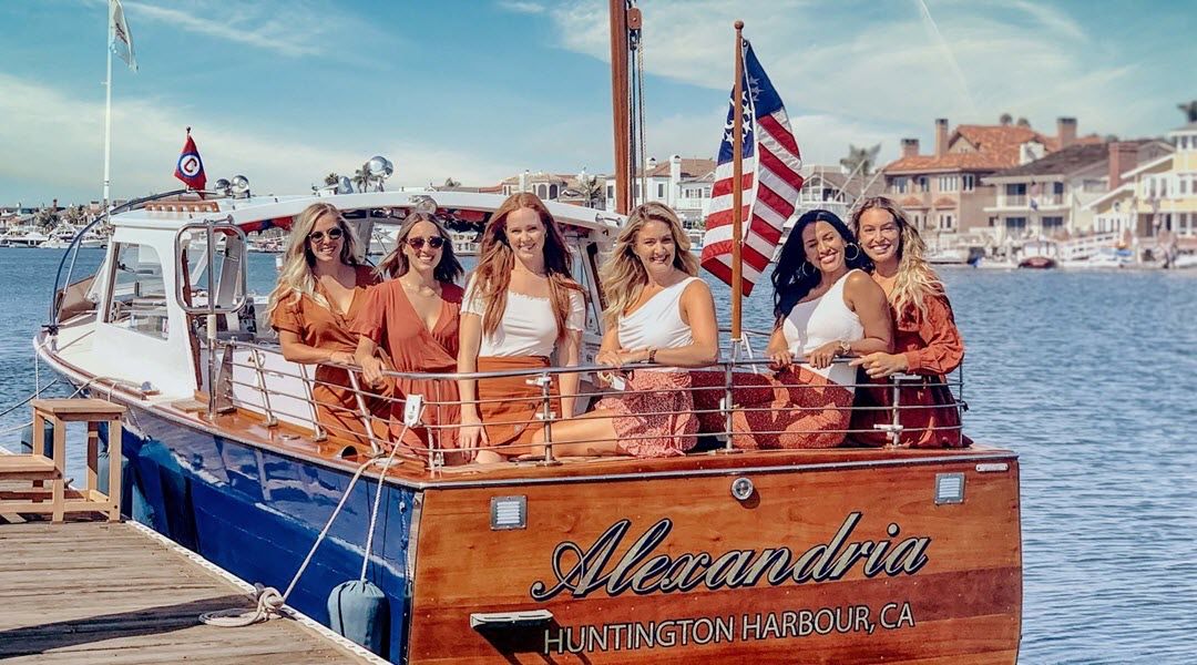 Girls day out in classic wood boat charter