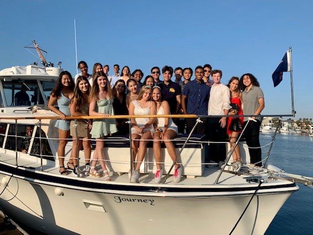 Teens celebrating a Sweet 16 aboard Journey